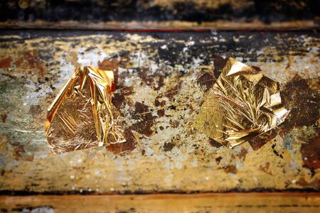 Gold Leaf ,Gold paper texture on Buddha sculpture.の写真素材