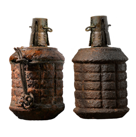 Old combat grenade isolated on a white backgroundの写真素材