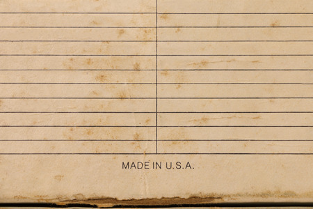 Sheet of stained lined paper, Vintage Grungy Lined Paperの写真素材