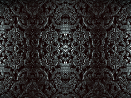 wood carving in flower pattern with black and white styleの写真素材