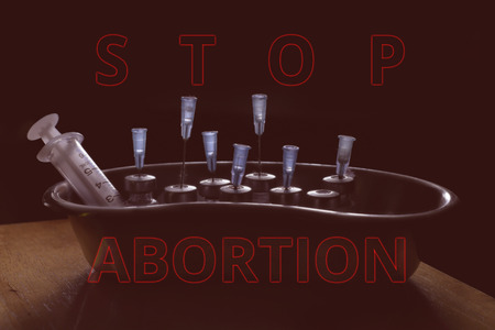 dirty injection medication and injection devices in illegal clinic, stop abortion conceptの写真素材