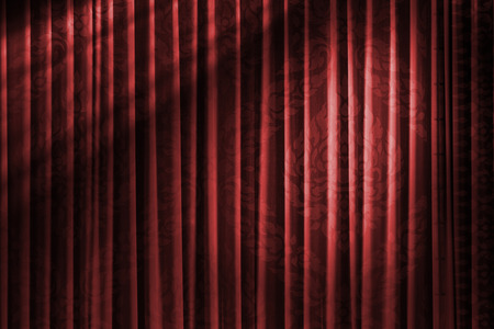 texture of asian style red curtain in vintage theatre with light shadeの写真素材