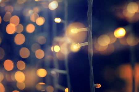 yellow string lights with bokeh decor in outdoor restaurant