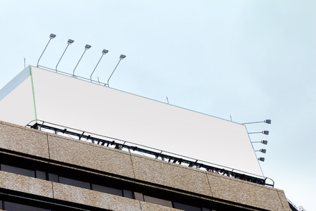 blank advertising billboard on buildingの写真素材