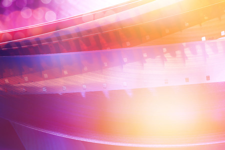 blurred colour film strips background, copy space