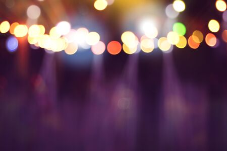 blurred lights on stage, abstract image of concert lighting, background party blur celebration...