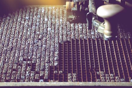 old lead Chinese characters used in typesetting, vintage letterpress backgroundの写真素材