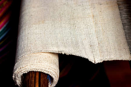 rough cotton fabric on loom in Thailand, raw material plain fabric for natural dyeingの写真素材