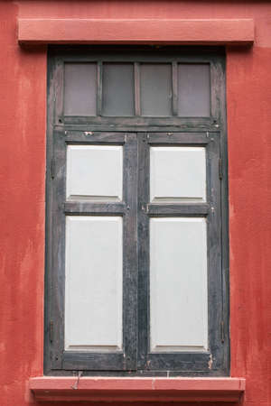 Old wooden windows are closed の写真素材