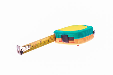 Measuring tape on white background