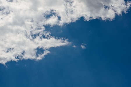 White clouds in blue sky.
