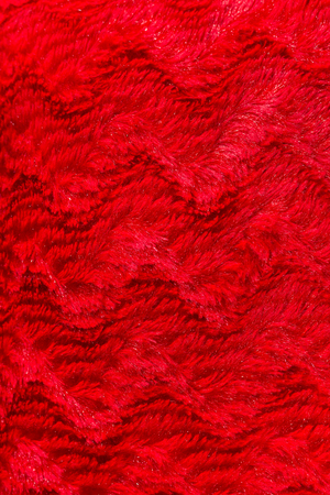 red faux fur texture background
