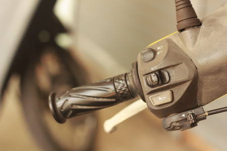 Switches for signals on a motorcycle.