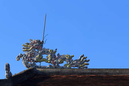 Dragon sculpture on the roofの写真素材