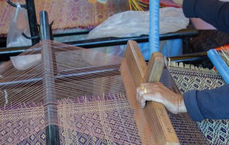 People are weaving matsの写真素材