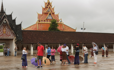 Tourists are to pray seek blessings in temple Ing Hang.Savannakhet,Laos,August 2016のeditorial素材