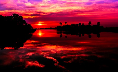 Sunset behind the pond