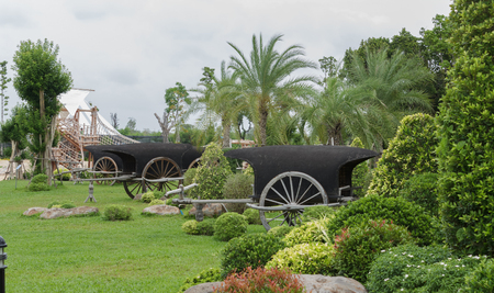 Ancient carts for beautiful garden decor.の写真素材