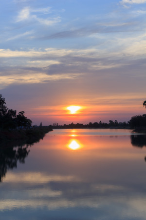 Beautiful sunset on the river.の写真素材