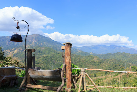 Wooden chairs for a scenic ride on the mountain.の写真素材