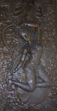 Angels are made of metal in Thai temples.
