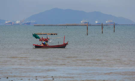 Fishing boat on the sea shore.の写真素材