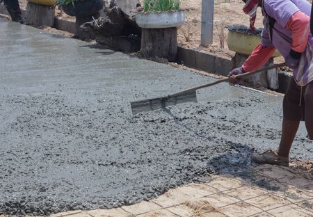 workers were building a concrete road.