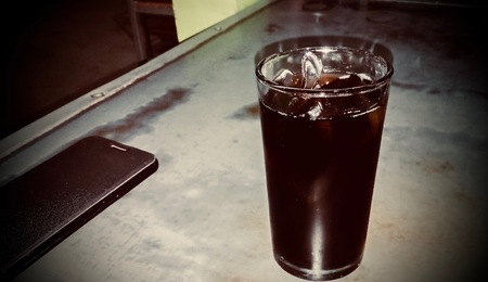 Soft drinks in the glass on the table.の写真素材