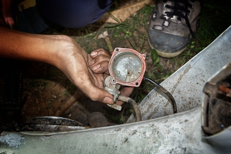 Technicians are repairing motorcycles to customers.の写真素材
