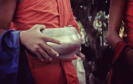 Monks receive food from people.の写真素材