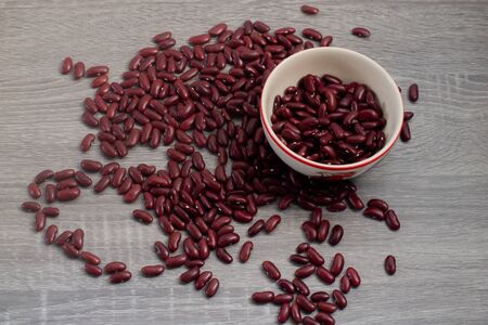 Red Bean in cup with gray wood backgroundの写真素材