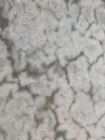 Cement Wall Closeup Broken Texture Gray Color Details Background, Grunge Style show Material Crack looks Dirty and Abstract, Pattern for Loft Decorative Wallpaper Design. Wet Pattern Concrete Closeup.の写真素材