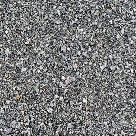 Scree Surface Decoration Top View Background. Stone Details of Pebbles on the walkway. Gray Concrete Stone Texture Construction Material. Natural Rock Pattern Closeup. Pebble Ground Grunge Wet Outdoorの写真素材