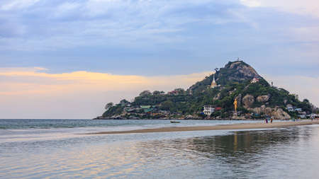 Hua Hin Beach, Thailand. The most popular place for relaxation, bright sunshine. Serene and peaceful with water and sand. Outdoor full length for background or wallpaper, Vacation, and travel concept.の写真素材