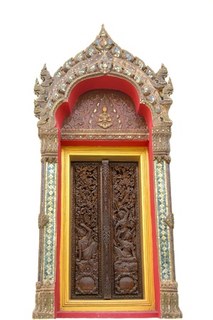 Thai ancient design on wooden door in temple of  Kalasin Thailandの写真素材