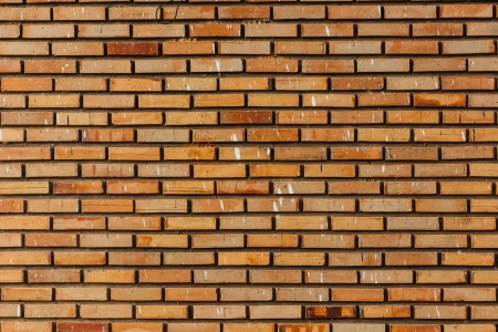 Wall background of a house from a red brickの写真素材