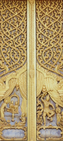 Pattern in traditional Thai style art on door of the templeの写真素材