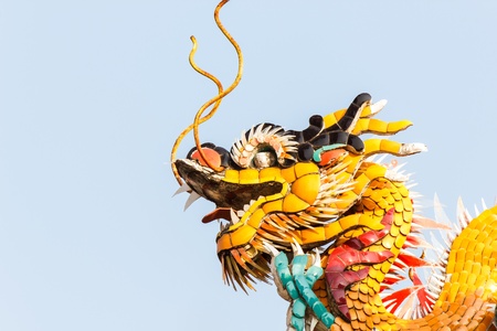 Yellow Dragon sculpture of thailand in the temple