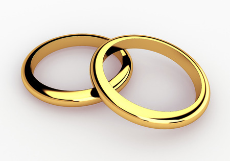 3D couple golden wedding rings and reflection in isolated background with work paths, clipping paths includedの写真素材
