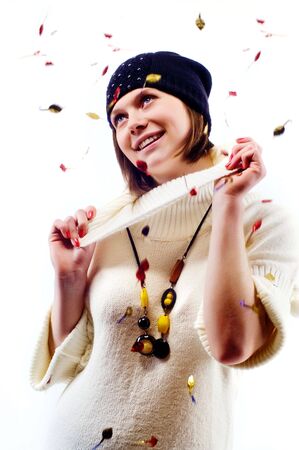 Winter portrait of the beautiful young surprised smiling womanの写真素材