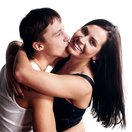 Happy smiling couple in love. Over white background の写真素材