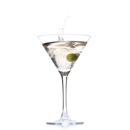 Cocktail with olive splash isolated on whiteの写真素材