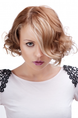 Fashion portrait of a beautiful blonde woman with red lips の写真素材