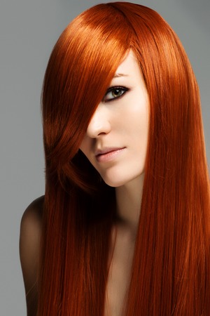 Beautiful Brunette Girl with Healthy Long Hairの写真素材
