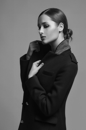 High fashion model in winter fur coat clothesの写真素材