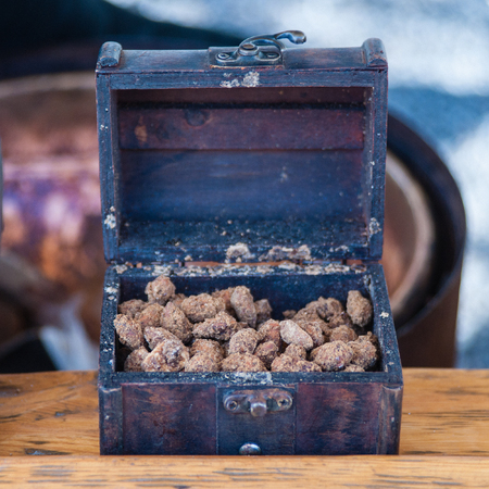 Scandinavian baked breaded almond nuts with cinnamon, garlic, peの写真素材