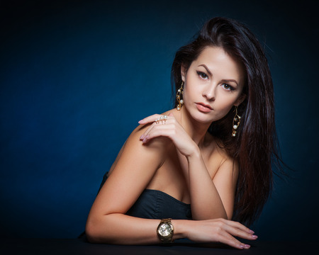 Beautiful woman with evening make-up. Jewelry and Beauty. Fashion photoの写真素材