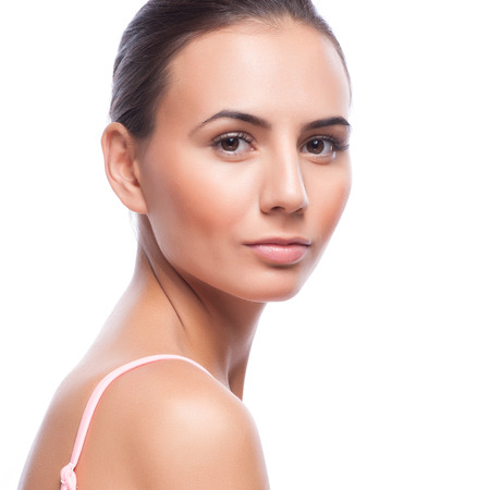 Beautiful Young Woman Touching Her Face.Fresh Healthy Skin.Isolated on White Beautiful Young Woman Touching Her Face.Fresh Healthy Skin.Isolated on White