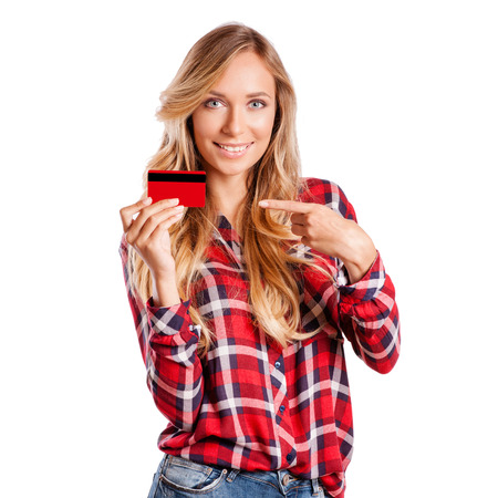 fashion, shopping, banking and payment concept - smiling elegant woman with plastic credit cardの写真素材
