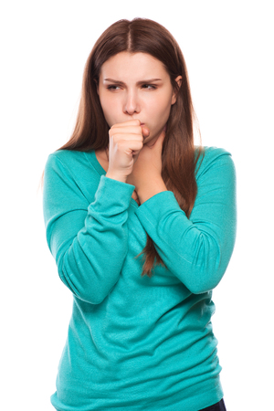 portrait of an young woman coughing with fistの写真素材